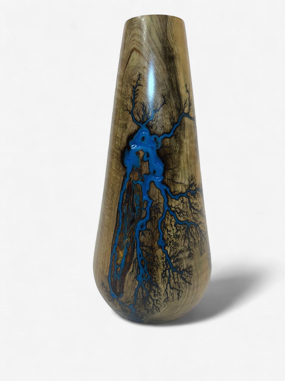 9” tall 4.5” wide bottom Magnolia vase with glow in the dark resin by Turned and Burned.
