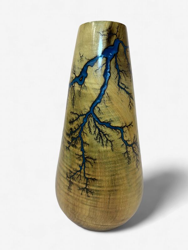 8.5” tall 4”wide bottom Magnolia vase with glow in the dark resin by Turned and Burned.