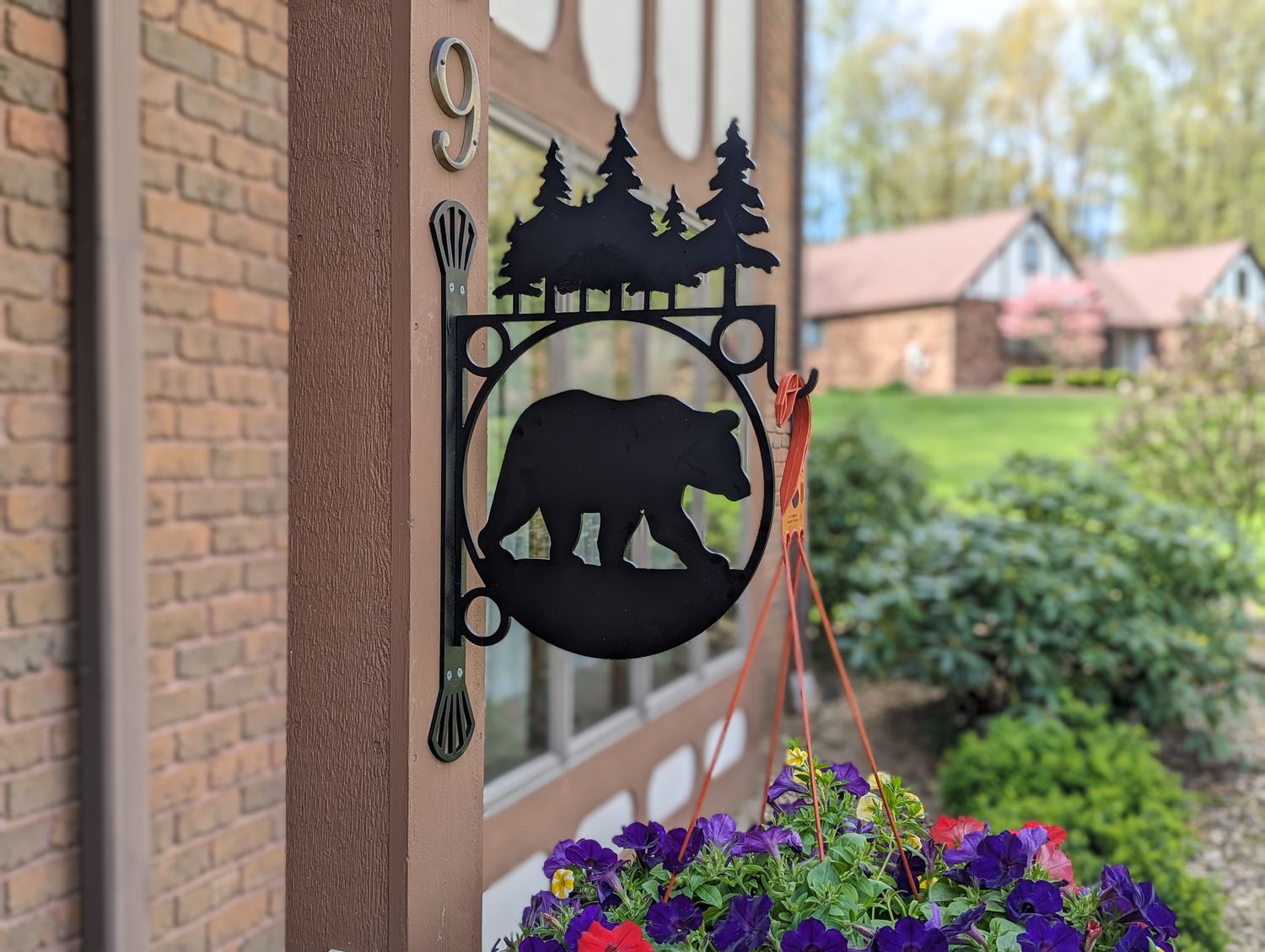 Heavy Duty Indoor/Outdoor Decorative Plant Hanger, Large Centerpiece with Bear with Pine Trees Topper and Spokes Mounting Bracket