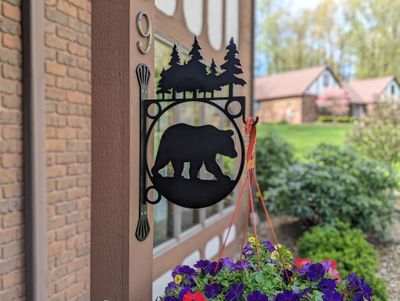 Heavy Duty Indoor/Outdoor Decorative Plant Hanger, Large Centerpiece with Bear with Pine Trees Topper and Spokes Mounting Bracket