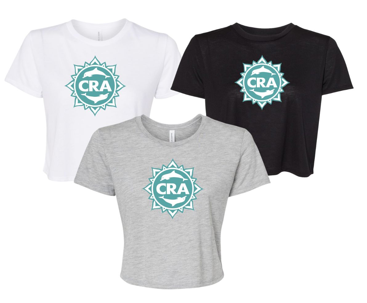 CRA Dolphins TEAL TEAM LOGO Ladies Flowy Crop Tee - Athletic Heather, Black or White - Adult CRA Dolphins TEAL TEAM LOGO Ladies Flowy Crop Tee - Athletic Heather, Black or White - Adult