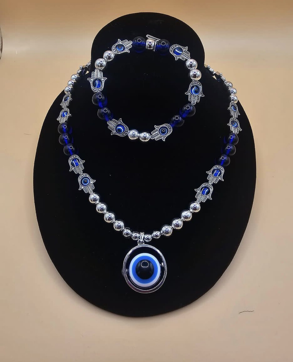 The Hamsa Hand and Giant Evil Eye Hamsa Bracelet (available upon request)