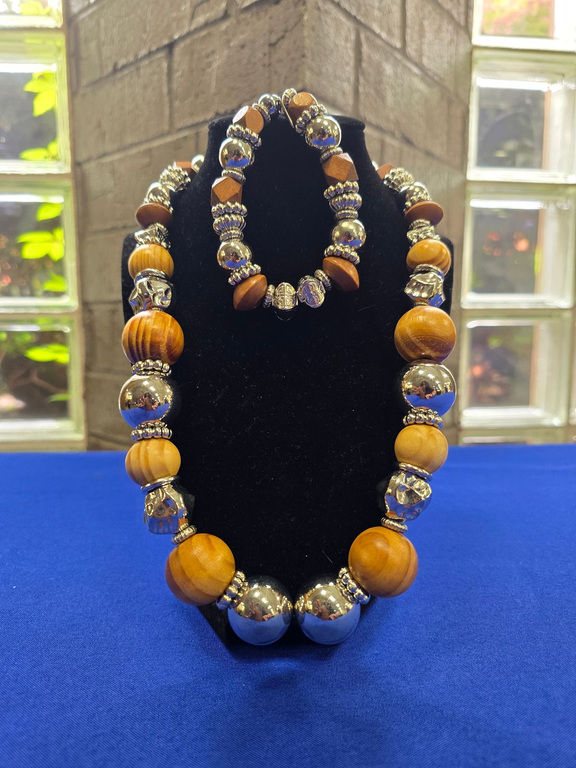 Brown and Silver Beaded Necklace with a la cart bracelet. Bracelet is $38.00 separately.
