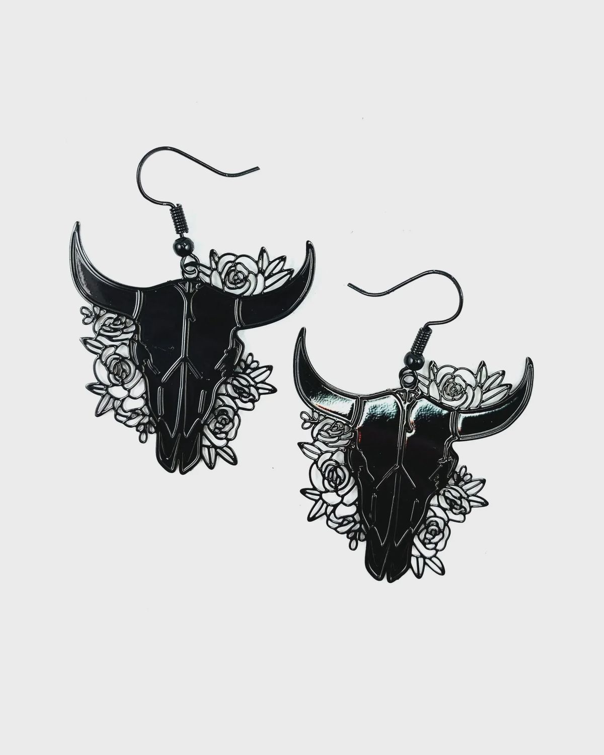 Filigree bulls head cowskull drop earrings