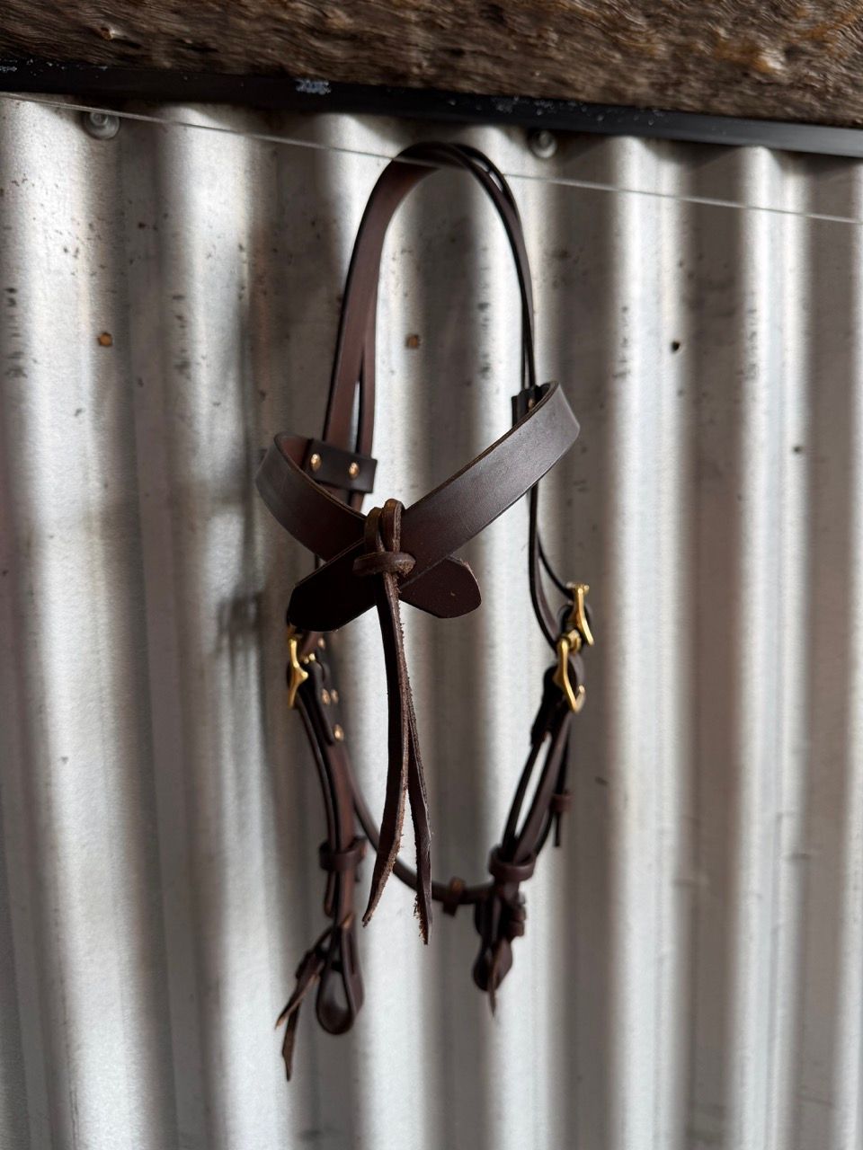 Brown leather extended poll bridle