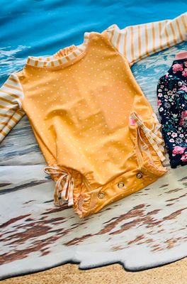 RuffleButts- Polka Dot One Piece Rash Guard L/S UPF50+