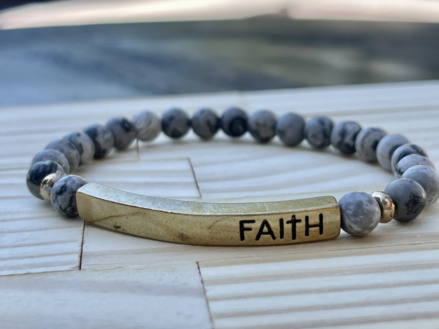 Faith Embossed on Gold with Grey Beads Stretchy Bracelet