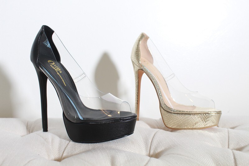 Timeless heels by Olivia in black and gold with clear finish, peep-toe silhouette, and bold, elegant style.