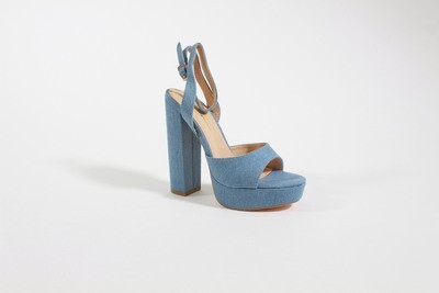 Angela by Olivia. Step into casual chic with these stylish denim shoes.  They feature a peep toe, an adjustable ankle strap, and a denim platform. The heel matches the denim material of the shoe, adding a cohesive and fashionable touch. Perfect for any casual outing, add a touch of effortless style to your wardrobe.