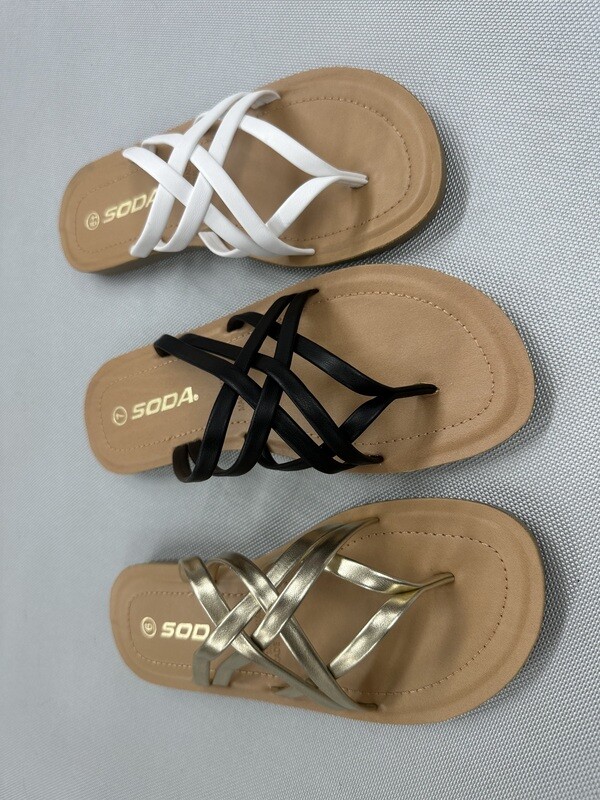 JULIO sandals in white, black, and gold with intricate straps and logo detail, designed for everyday elegance.