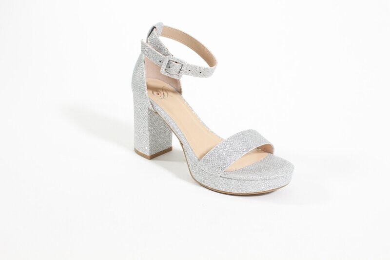 Silver glitter block heels with ankle strap and open toe for sparkle and stability.
