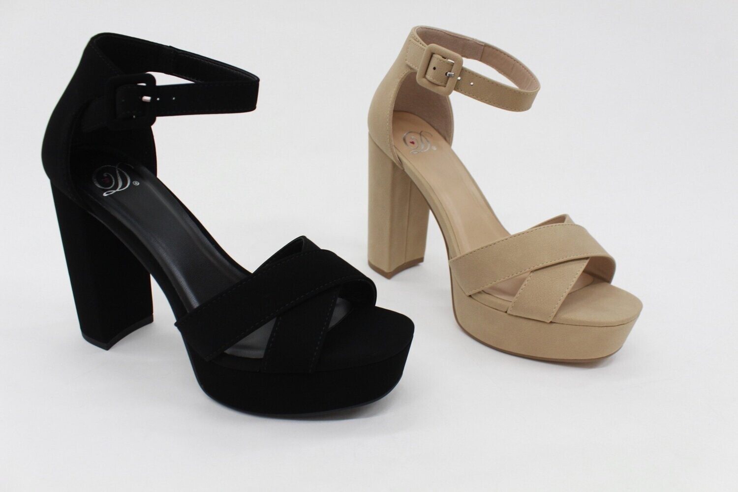 Sandrea heels in black and natural with crisscross straps, peep toe, and buckle ankle closure for chic elevation.
