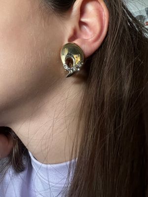 Orecchini dorati con zirconi