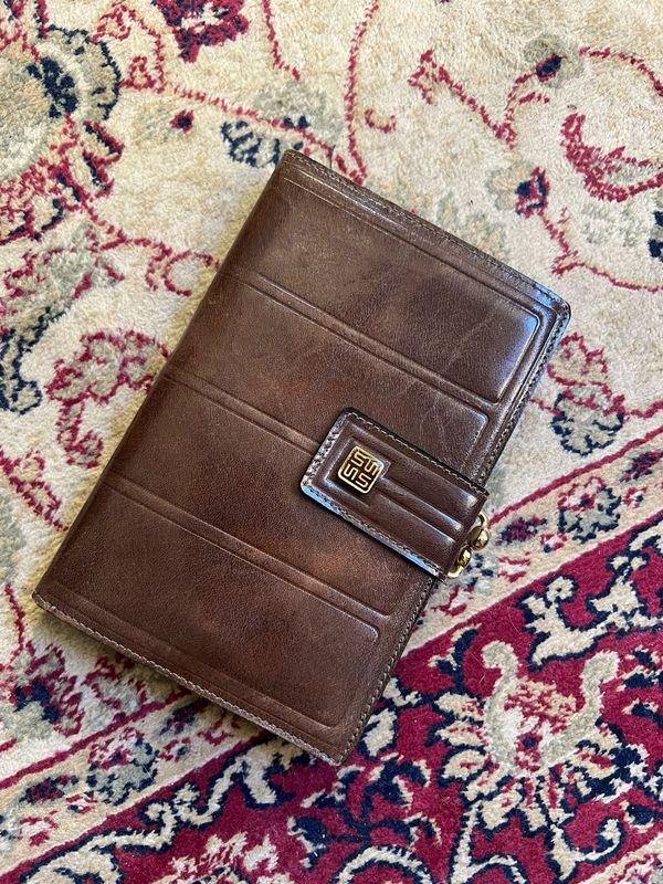 Portafoglio in pelle marrone lucida