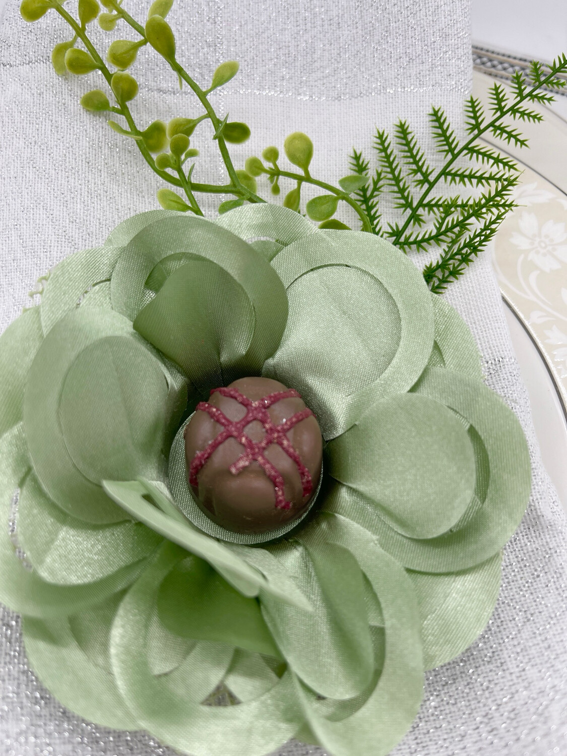 sage green fabric flower sweet holding. Flower used as party favor and decoration to hold sweets or finger food. 