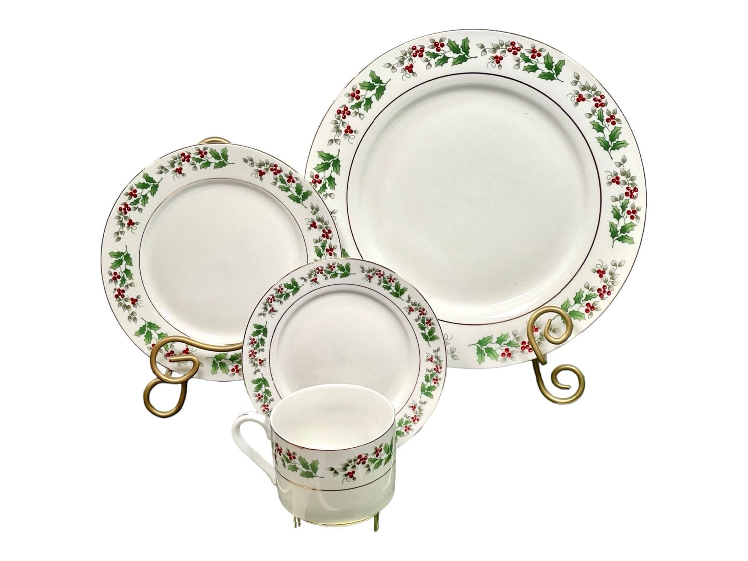 Gibson Holly Berries Christmas Dinnerware Set 4 Pieces. Christmas dinnerware place setting with dinner plate, salad plate, teacup and saucer. Beautiful Holidays tableware with berries and Holly.