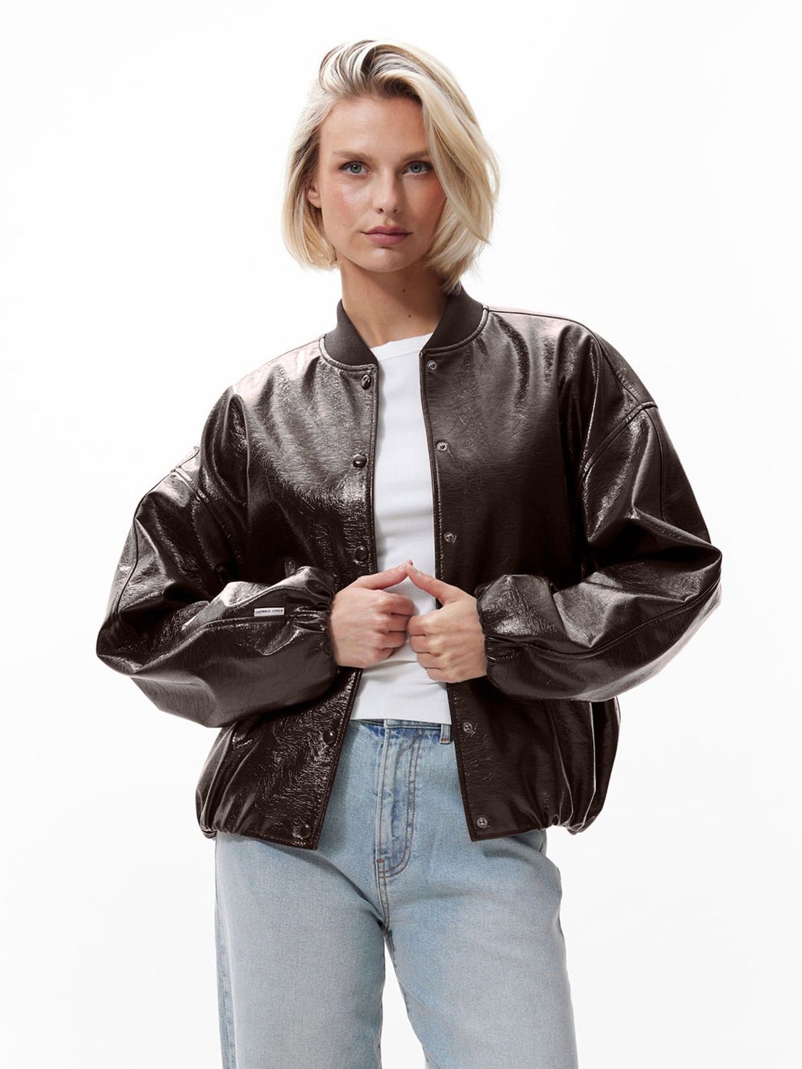 Catwalk Junkie Tuck in varsity jacket saved chocolate