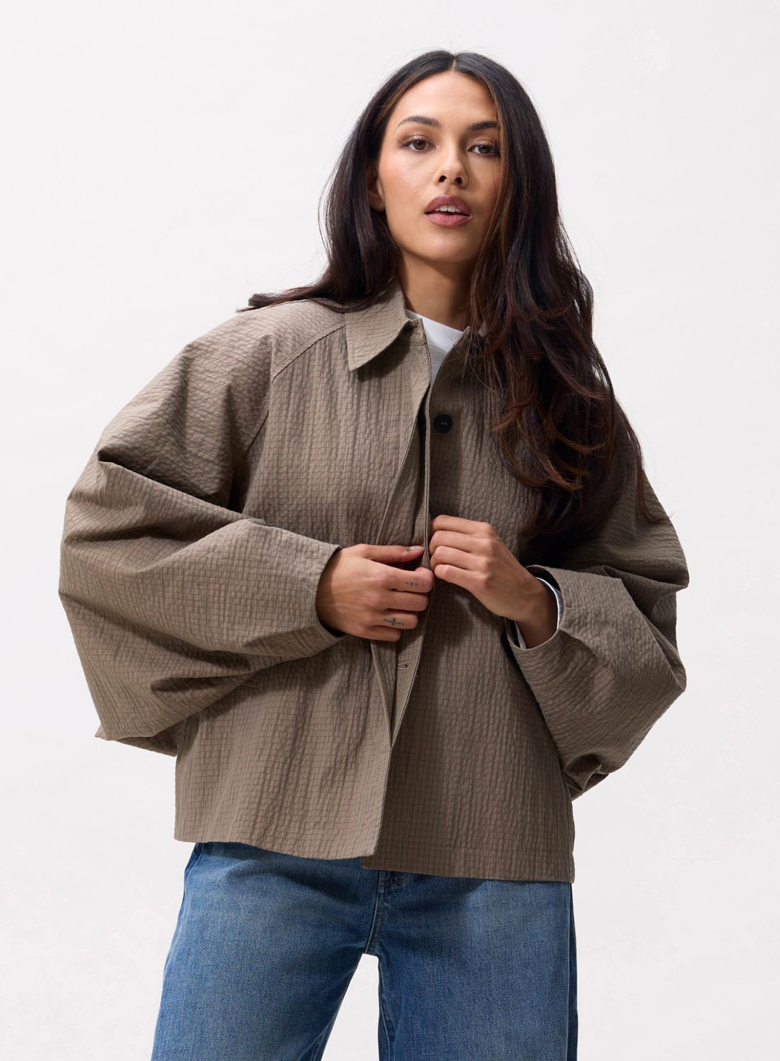 Catwalk Junkie | Check cape jacket