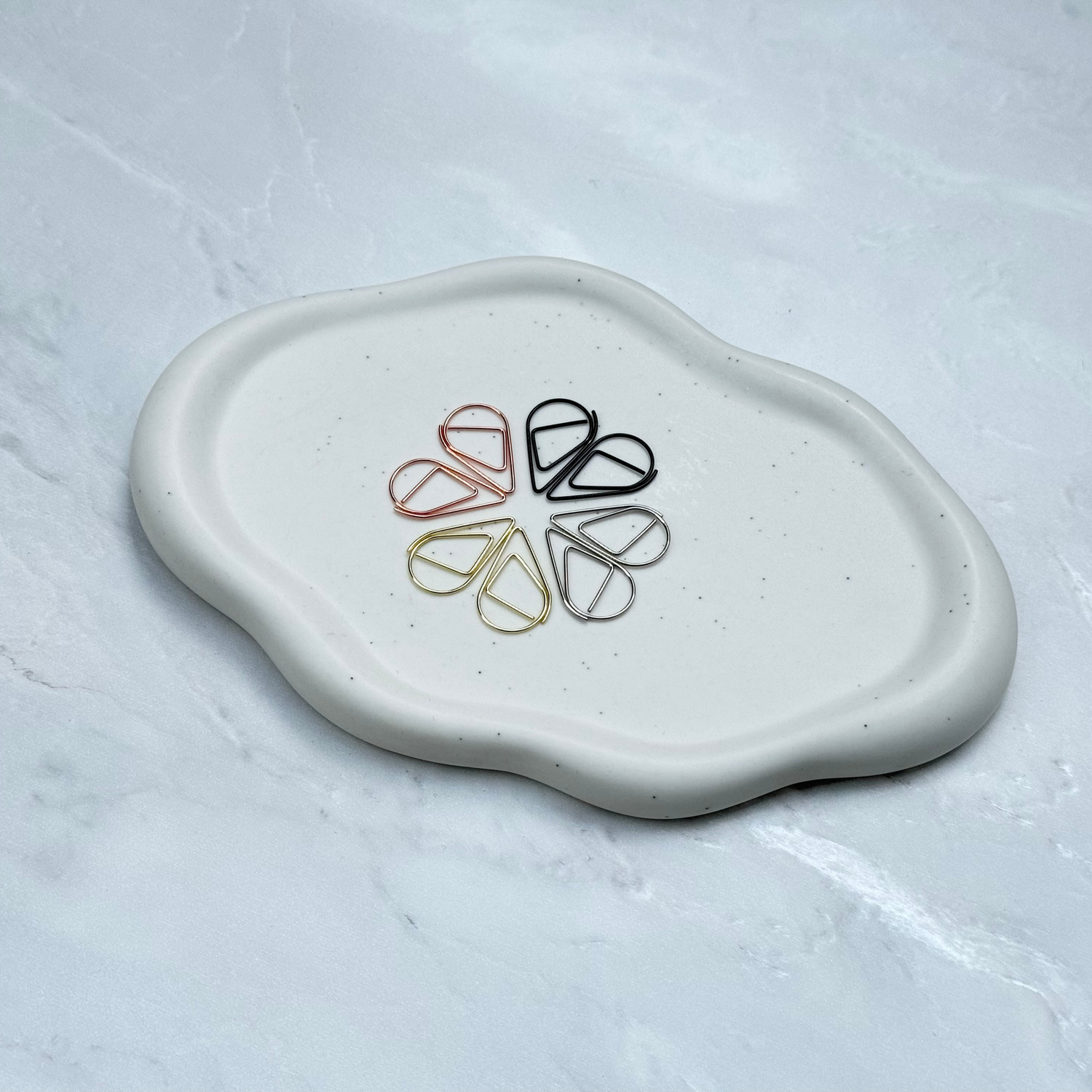 Büroklammern Wassertropfen