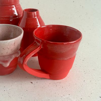 Red mug with angled handle