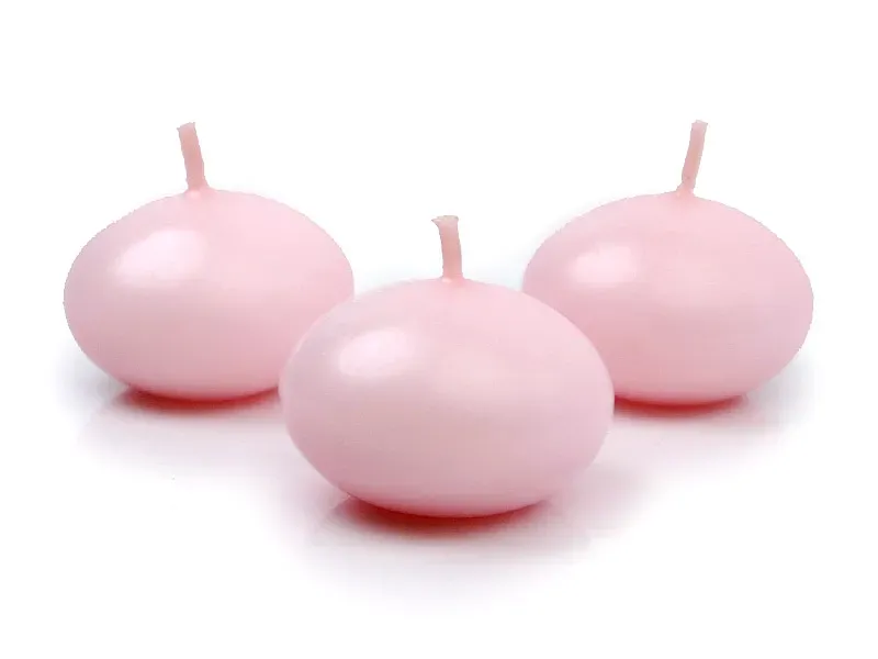 Kelluva vaaleanpunainen kynttilä