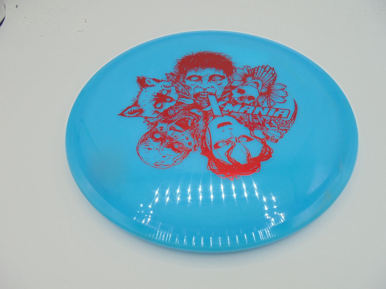Discmania Neo Mutant Blue Xmania Stamp 176g -DR