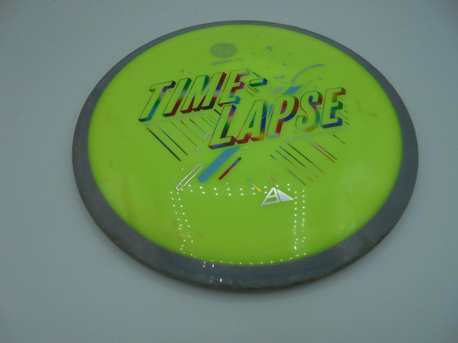 Axiom Neutron Timelapse Yellow SE Stamp 171g -AH