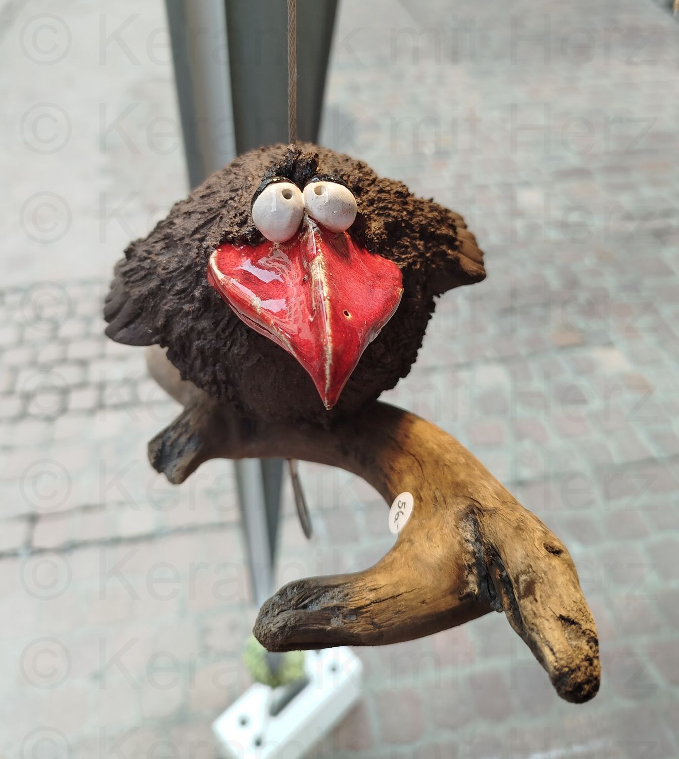 Rabe hängend gross