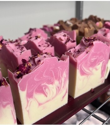 Bars of white soap with Pink Swirl and Rose petals on top