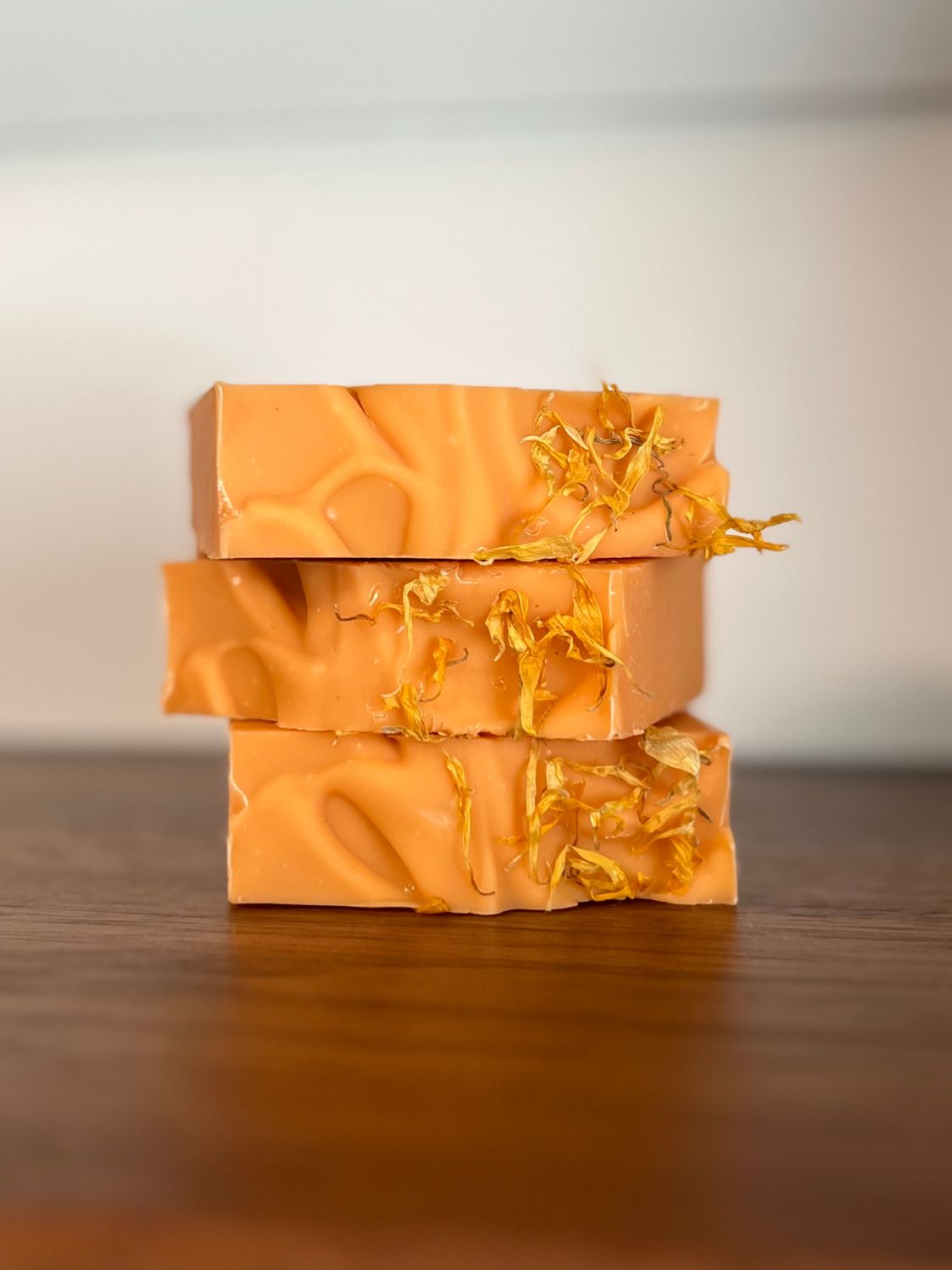 Orange Soap Bar with dried marigold on top