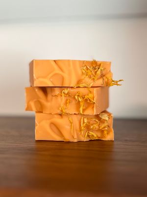Orange Soap Bar with dried marigold on top