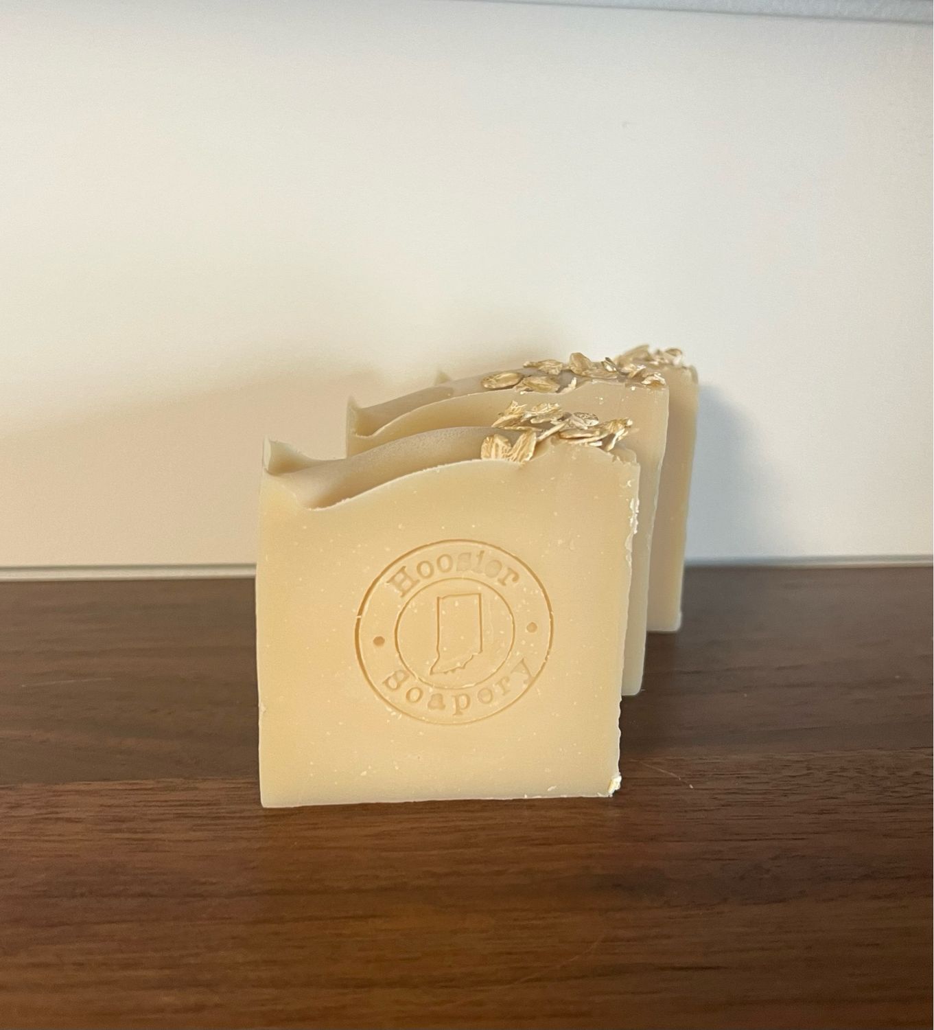 3 Tan Colored Soap bars with stamp and oats on the top