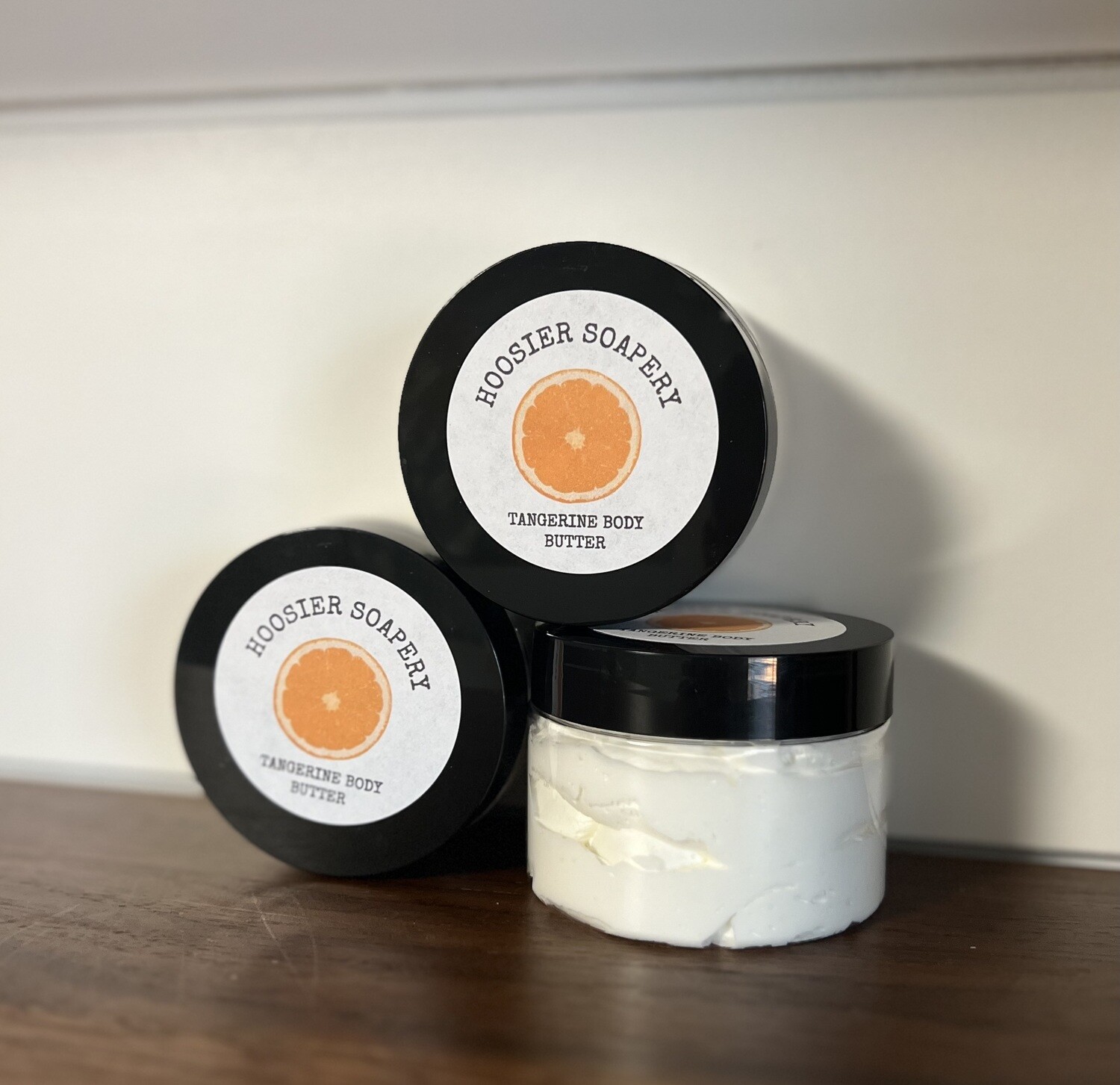 Plastic Jars with White Lotion with Black Lid