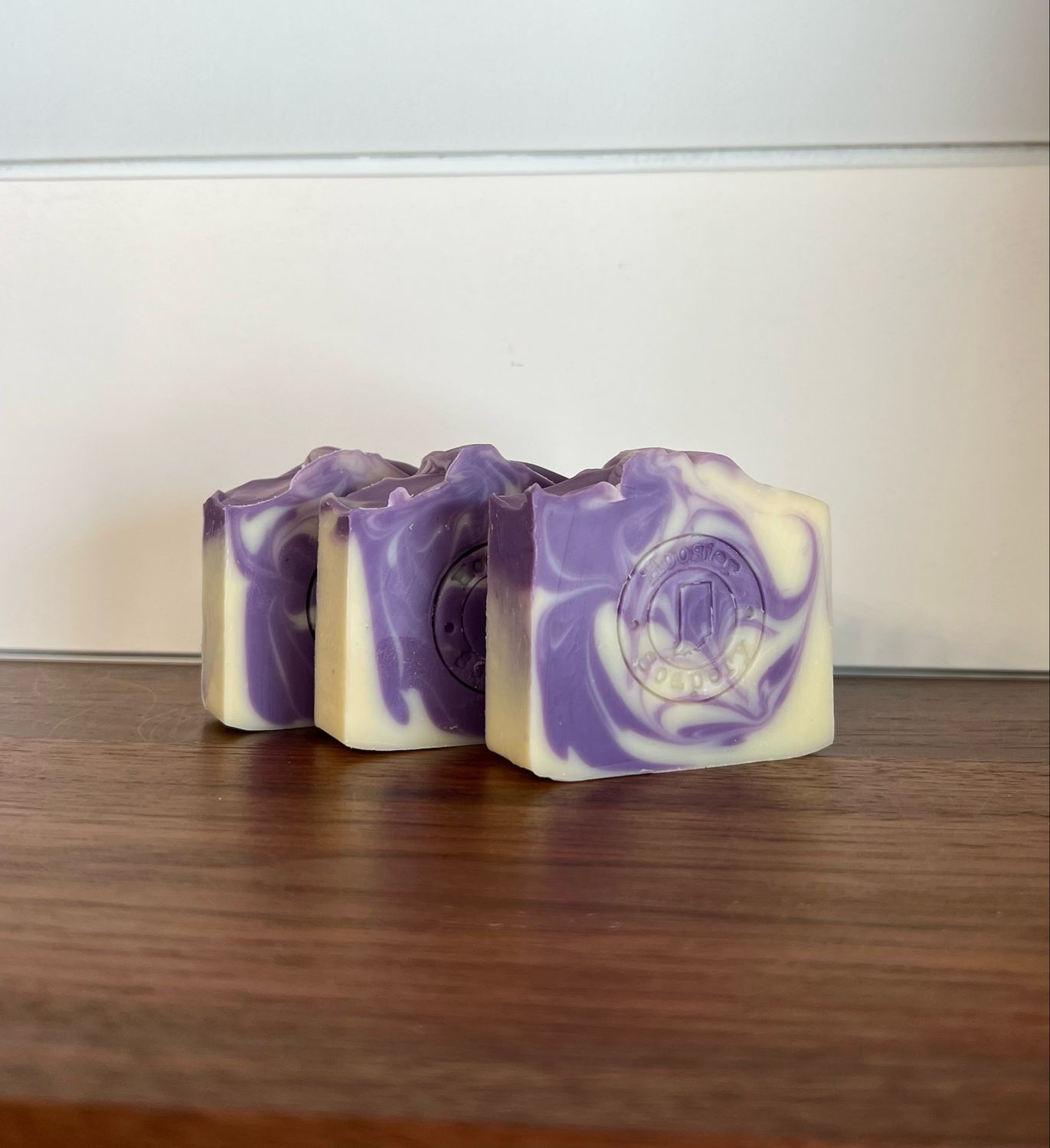 3 soap bars with purple and ivory swirl