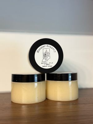 3 jars of tan sugar scrub with black lid