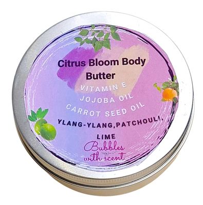 Citrus Bloom Body Butter in metal tin by Bubbles with Scent – enriched with vitamin E, jojoba oil, carrot seed oil, ylang-ylang, patchouli, and lime.