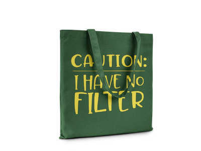 Green canvas tote bag with large yellow text "Caution: I Have No Filter