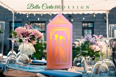 Create a unique wedding themed Lantern using this 3D SVG template and a Cricut, Silhouette or other cutting machine.  This beautiful hand-made paper lantern features a Bride and Groom cutout and fits over a standard US LED pillar candle.