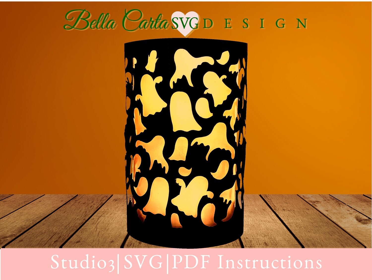 Black paper lantern with cutout images of ghosts all around a pillar LED Candle.