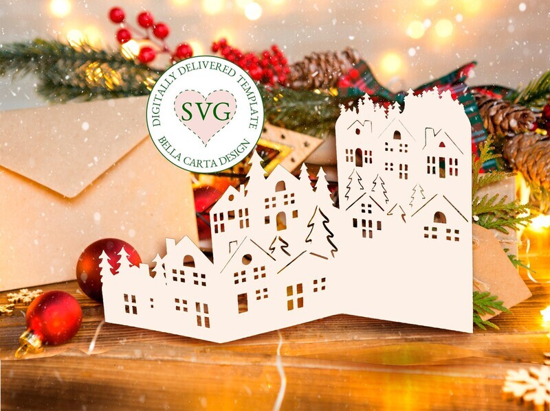 3D SVG Christmas card template for Cricut and Silhouette cutting machines complete with cozy homes and pine trees nestled among mountains.