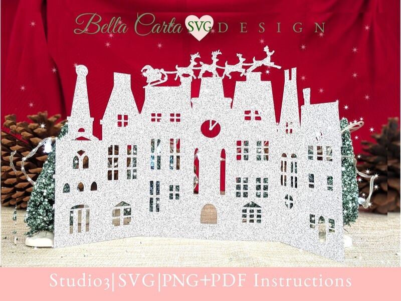 Finished 3D Christmas card using an SVG template with a Cricut or Silhouette is in the shape of a Victorian village at midnight when Santa and his reindeer fly over, delivering presents to all the children.   Shown here in silver glitter cardstock.