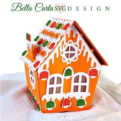 Finished 3D SVG Cricut project of a pop-up Christmas Village house decorated with gumdrop candies and an LED tealight inside the door to make it glow.  This decoration is part of the Christmas Treat Village set by Bella Carta Design.