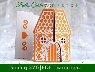 Gingerbread House Card or Invitation made with a 3D SVG for Cricut and Silhouette. It features intricate icing decorations and is shaped like a charming gingerbread house with a gate-fold door. 