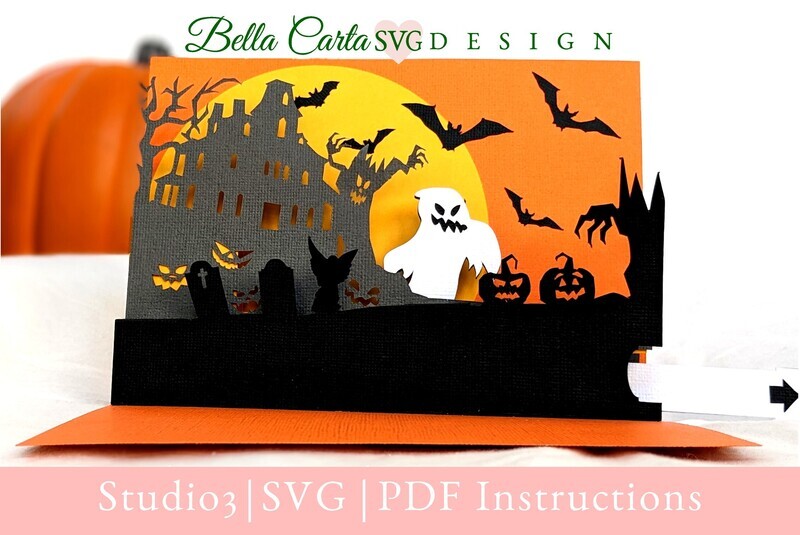 3D SVG Halloween Pop-Up Card features a spooky haunted house, chilling gravestones, eerie jack-o&#39;lanterns, and creepy trees. As you pull the tab, a ghost pops out of the haunted house, adding an extra element of surprise and delight. The card front says Happy Halloween against a full moon with bats. Perfect for Cricut and Silhouette cutting machines.
This is a project for advanced paper crafters looking for a little extra challenge that provides a large Wow factor. It cuts cardstock and fits together to make a 3D pop-up card with an interactive ghost that comes out when you pull a tab. The template includes a lined A7 envelope with a Jack O&#39;Lantern decoration.
