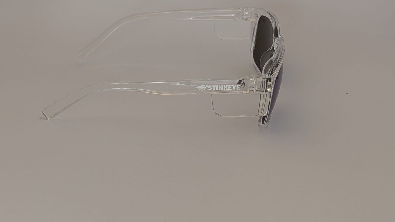 Safety Glasses - The Model "T" Clear Frame with Green Revo Polarised Lens