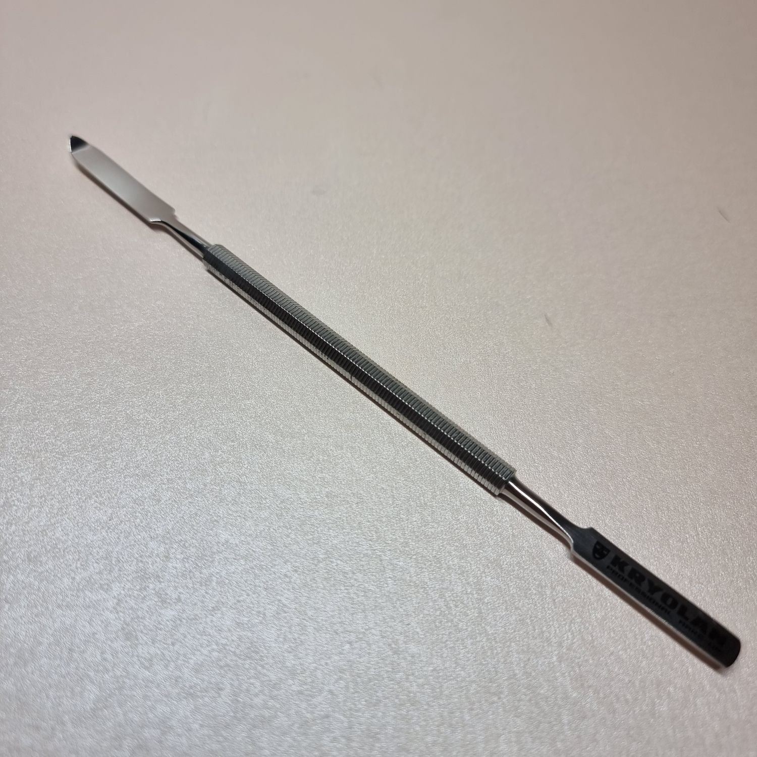 Spatule plate/pointe arquée