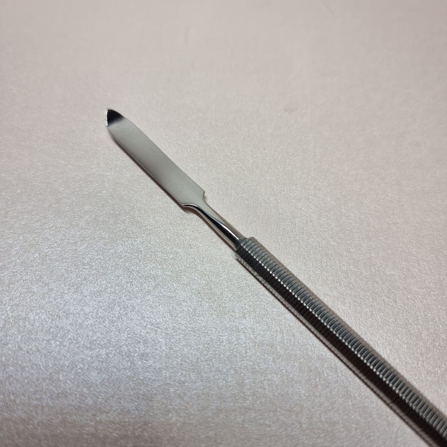 Spatule plate/pointe arquée