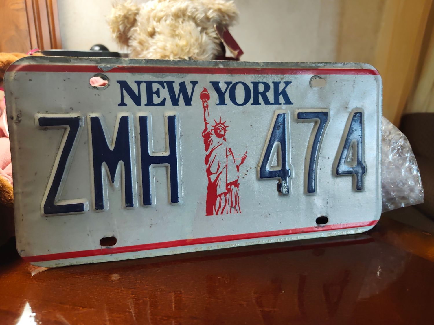 POUR CLAIRE PLAQUE NY