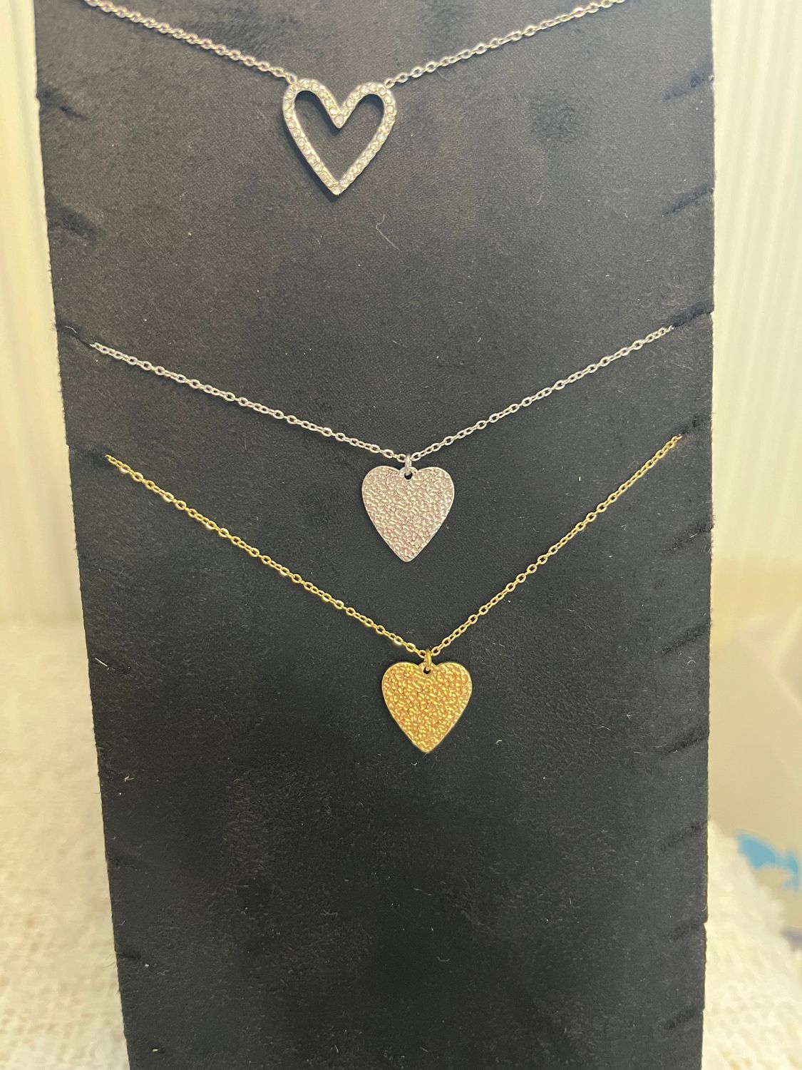 Melted heart necklace