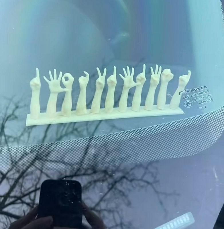 Magnetic gesture parking license plate with adhesive